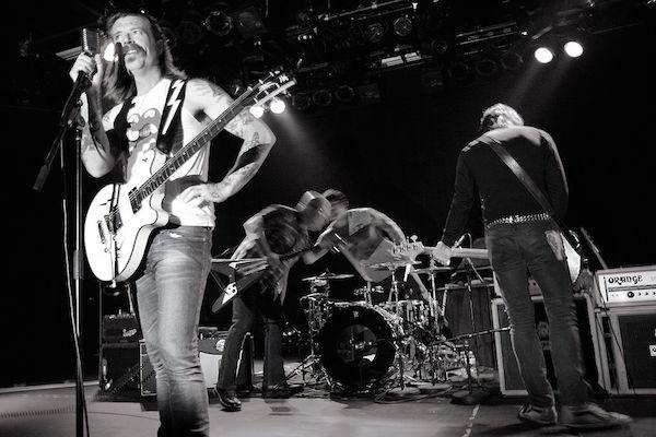 1024px-Eagles_of_Death_Metal_on_stage_at_the_Commodore_Ballroom_July_20th_2009.jpg