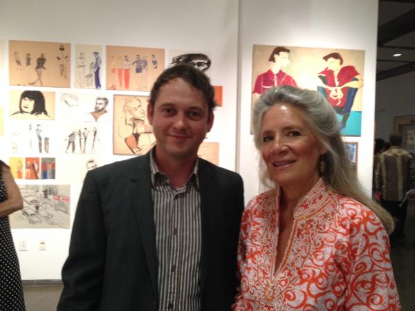 ARAF's Tobin Russell with Valerie Aldridge in front of works by Margaret Katz Nodine, Debbie McMahon, and others. lg.JPG